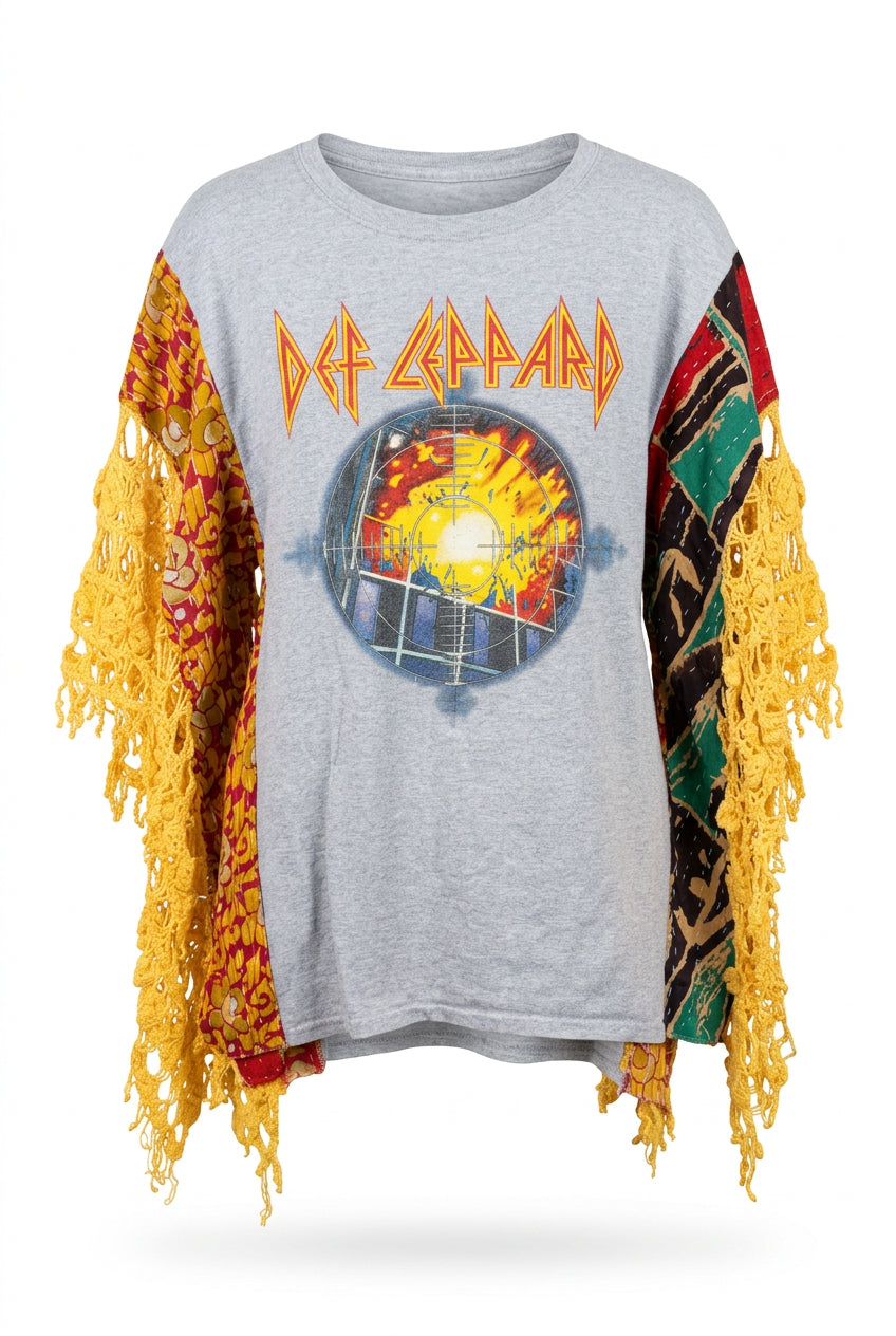 Trestles Clothing Company upcycled Def Leppard graphic tee poncho with yellow crochet sleeves and boho patchwork detail